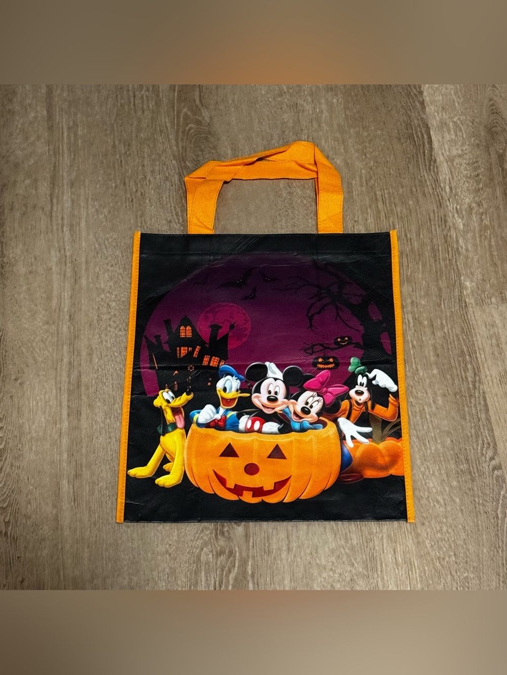 Disney Halloween Tote Bag with Orange Handles and Black Background
